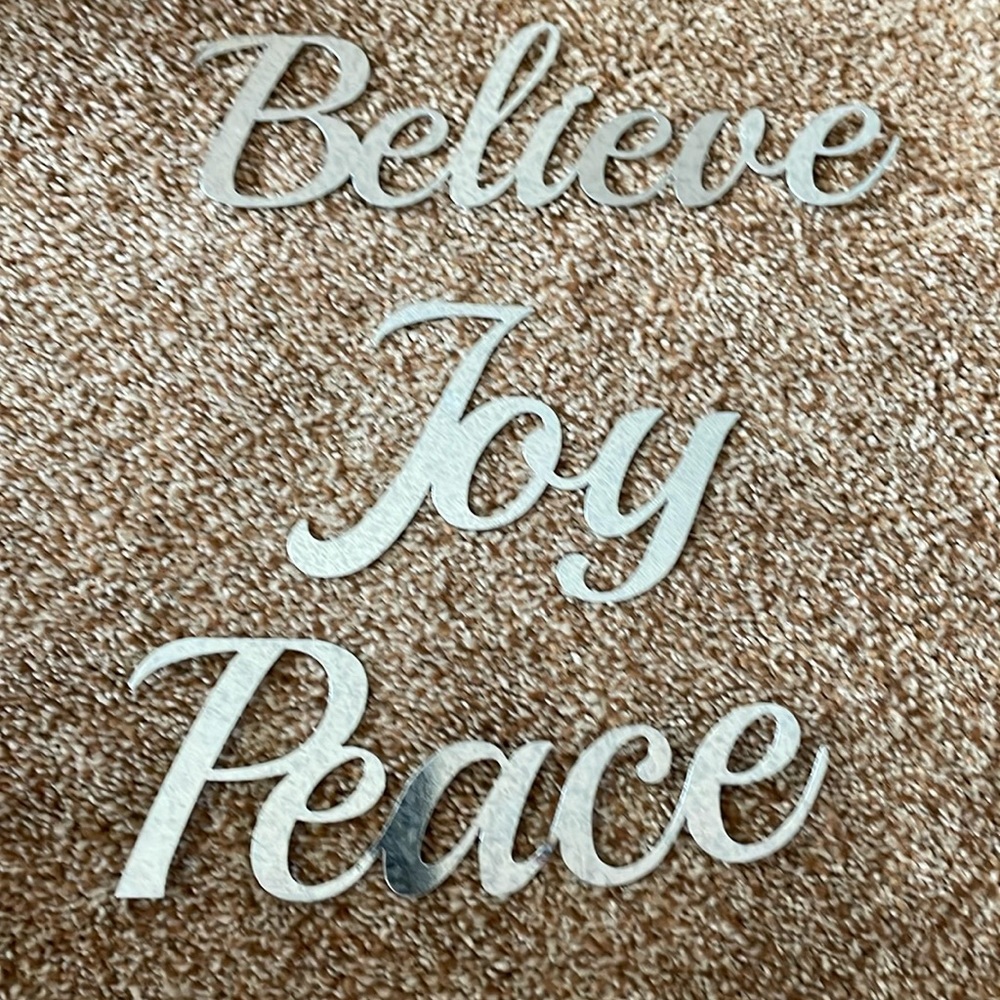 Three galvanized metal words for crafting